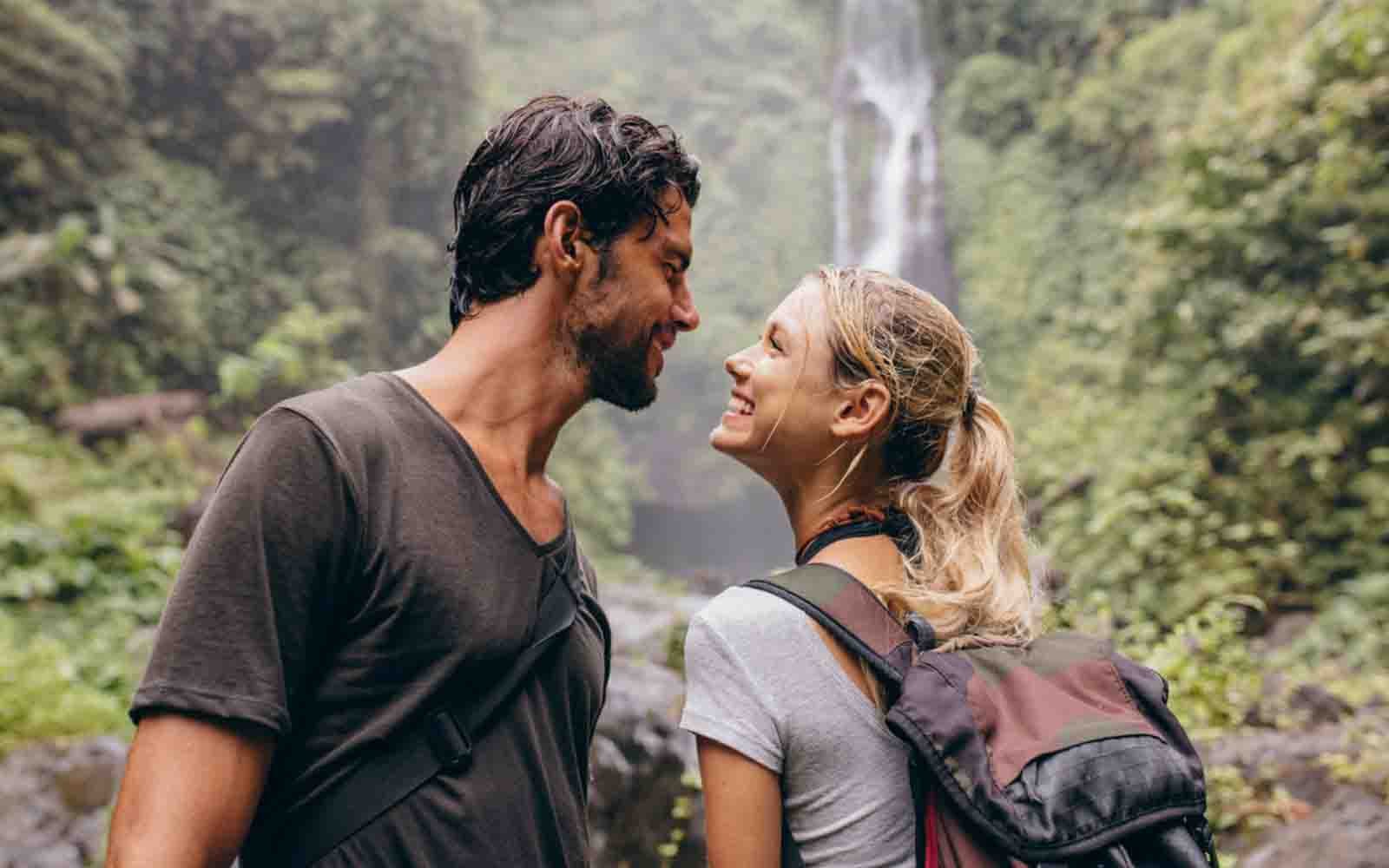 Couple photography at a rainforest waterfall in La Fortuna, Costa Rica